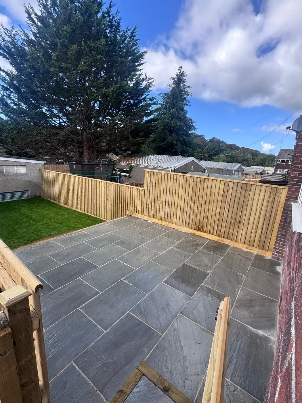 Timber fencing around a finished patio